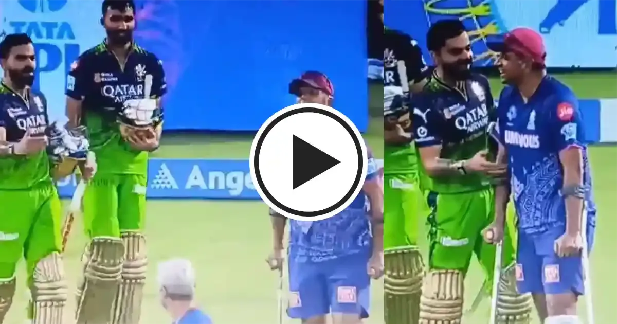 virat kohli s request to crutches bound rahul dravid goes viral from rr vs rcb game in ipl 2025 sportstiger