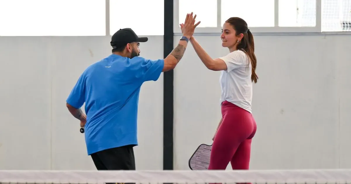 virat kohli and anushka sharma form pair for pickleball match at rcb team event held ahead of srh game in ipl 2025